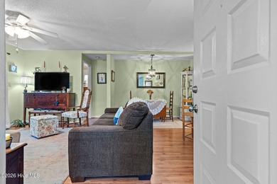 Nestled beneath a canopy of mature longleaf pines, this charming on Hyland Golf Club in North Carolina - for sale on GolfHomes.com, golf home, golf lot