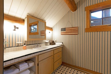 Welcome to the Cayuse Cabin. This lovely 4-bedroom, 4-bathroom on Stock Farm Club in Montana - for sale on GolfHomes.com, golf home, golf lot