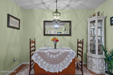 Nestled beneath a canopy of mature longleaf pines, this charming on Hyland Golf Club in North Carolina - for sale on GolfHomes.com, golf home, golf lot