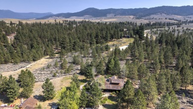 Welcome to the Cayuse Cabin. This lovely 4-bedroom, 4-bathroom on Stock Farm Club in Montana - for sale on GolfHomes.com, golf home, golf lot