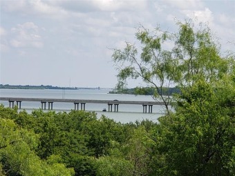 Beautiful Build Site overlooking Joe Pool Lake.  .87 of an acre on Tangle Ridge Golf Club in Texas - for sale on GolfHomes.com, golf home, golf lot
