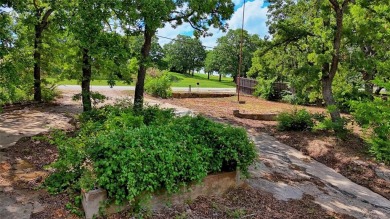 If you are interested in owning a residential waterfront lot on on Twisted Oaks Golf Club in Texas - for sale on GolfHomes.com, golf home, golf lot