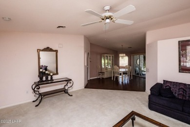 Welcome to 1811 Duel Dr. This original owner home is nestled on London Bridge Golf Course in Arizona - for sale on GolfHomes.com, golf home, golf lot