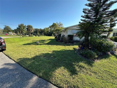55+ Gated golf course community large 2 bedroom 2 bath home on a on Zellwood Station Country Club in Florida - for sale on GolfHomes.com, golf home, golf lot