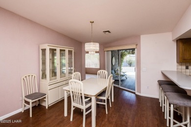Welcome to 1811 Duel Dr. This original owner home is nestled on London Bridge Golf Course in Arizona - for sale on GolfHomes.com, golf home, golf lot