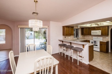 Welcome to 1811 Duel Dr. This original owner home is nestled on London Bridge Golf Course in Arizona - for sale on GolfHomes.com, golf home, golf lot
