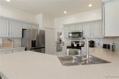 Welcome to your dream home nestled in the picturesque community on Twisted Oaks Golf Club in Florida - for sale on GolfHomes.com, golf home, golf lot
