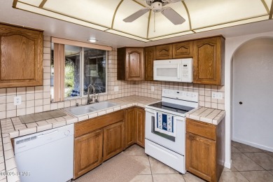 Welcome to 1811 Duel Dr. This original owner home is nestled on London Bridge Golf Course in Arizona - for sale on GolfHomes.com, golf home, golf lot