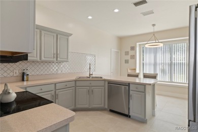 Welcome to your dream home nestled in the picturesque community on Twisted Oaks Golf Club in Florida - for sale on GolfHomes.com, golf home, golf lot