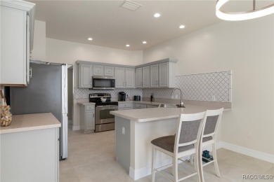 Welcome to your dream home nestled in the picturesque community on Twisted Oaks Golf Club in Florida - for sale on GolfHomes.com, golf home, golf lot