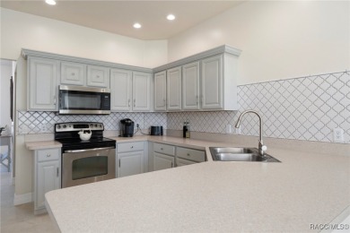 Welcome to your dream home nestled in the picturesque community on Twisted Oaks Golf Club in Florida - for sale on GolfHomes.com, golf home, golf lot