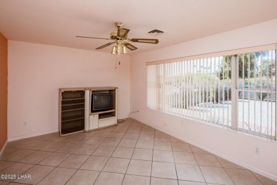Welcome to 1811 Duel Dr. This original owner home is nestled on London Bridge Golf Course in Arizona - for sale on GolfHomes.com, golf home, golf lot