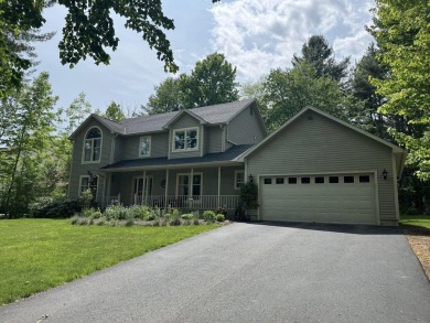 Thoughtfully maintained, 4-bedroom, 2.5-bath home perched upon a on The Links At Lang Farm in Vermont - for sale on GolfHomes.com, golf home, golf lot