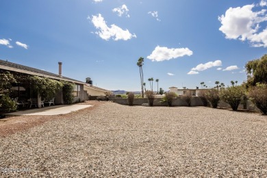 Welcome to 1811 Duel Dr. This original owner home is nestled on London Bridge Golf Course in Arizona - for sale on GolfHomes.com, golf home, golf lot