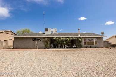 Welcome to 1811 Duel Dr. This original owner home is nestled on London Bridge Golf Course in Arizona - for sale on GolfHomes.com, golf home, golf lot