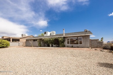 Welcome to 1811 Duel Dr. This original owner home is nestled on London Bridge Golf Course in Arizona - for sale on GolfHomes.com, golf home, golf lot