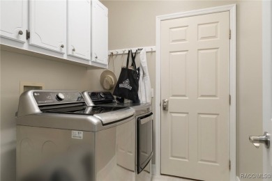 Welcome to your dream home nestled in the picturesque community on Twisted Oaks Golf Club in Florida - for sale on GolfHomes.com, golf home, golf lot