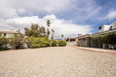 Welcome to 1811 Duel Dr. This original owner home is nestled on London Bridge Golf Course in Arizona - for sale on GolfHomes.com, golf home, golf lot