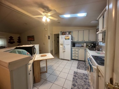 Welcome to this charming 1,248 sq ft home located in the on Del Tura Golf and Country Club in Florida - for sale on GolfHomes.com, golf home, golf lot
