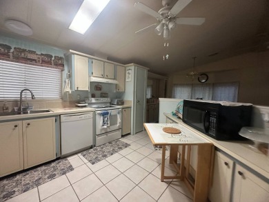 Welcome to this charming 1,248 sq ft home located in the on Del Tura Golf and Country Club in Florida - for sale on GolfHomes.com, golf home, golf lot