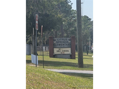 Build your dream home on this beautiful .58-acre homesite in on Pine Ridge Community Golf and Country Club in Florida - for sale on GolfHomes.com, golf home, golf lot