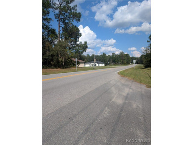 Build your dream home on this beautiful .58-acre homesite in on Pine Ridge Community Golf and Country Club in Florida - for sale on GolfHomes.com, golf home, golf lot