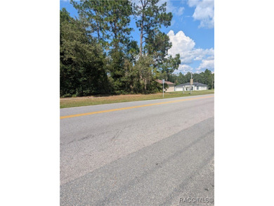 Build your dream home on this beautiful .58-acre homesite in on Pine Ridge Community Golf and Country Club in Florida - for sale on GolfHomes.com, golf home, golf lot