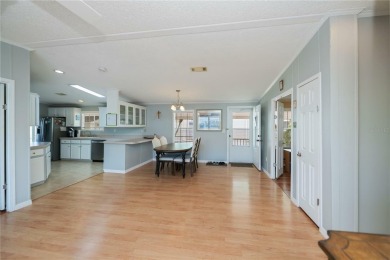 Don't overlook this sparkling clean, split bedroom, open floor on Maple Leaf Golf and Country Club in Florida - for sale on GolfHomes.com, golf home, golf lot