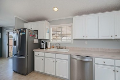 Don't overlook this sparkling clean, split bedroom, open floor on Maple Leaf Golf and Country Club in Florida - for sale on GolfHomes.com, golf home, golf lot