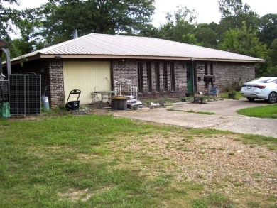 THIS HOME IS CLOSE TO MILLWOOD LAKE AND MILLWOOD GOLF COURSE on Millwood Landing Golf and R.V. Resort in Arkansas - for sale on GolfHomes.com, golf home, golf lot