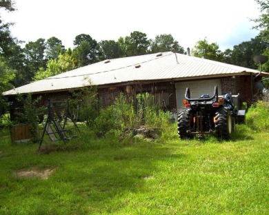 THIS HOME IS CLOSE TO MILLWOOD LAKE AND MILLWOOD GOLF COURSE on Millwood Landing Golf and R.V. Resort in Arkansas - for sale on GolfHomes.com, golf home, golf lot