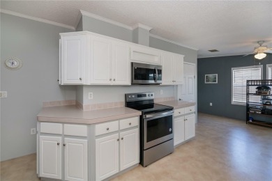 Don't overlook this sparkling clean, split bedroom, open floor on Maple Leaf Golf and Country Club in Florida - for sale on GolfHomes.com, golf home, golf lot