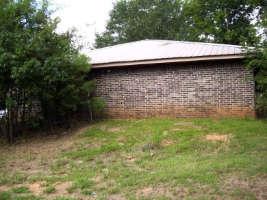 THIS HOME IS CLOSE TO MILLWOOD LAKE AND MILLWOOD GOLF COURSE on Millwood Landing Golf and R.V. Resort in Arkansas - for sale on GolfHomes.com, golf home, golf lot
