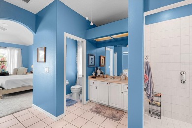 Discover a remarkable 4-bedroom, 3-bathroom pool home in the on Hunters Green Country Club in Florida - for sale on GolfHomes.com, golf home, golf lot