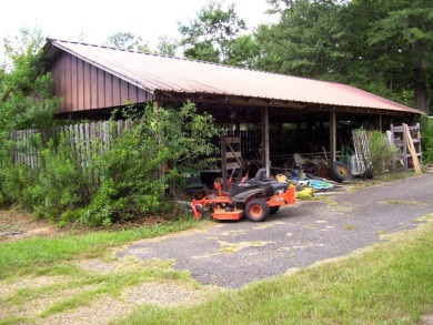 THIS HOME IS CLOSE TO MILLWOOD LAKE AND MILLWOOD GOLF COURSE on Millwood Landing Golf and R.V. Resort in Arkansas - for sale on GolfHomes.com, golf home, golf lot
