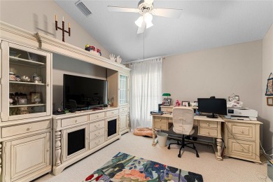 Discover a remarkable 4-bedroom, 3-bathroom pool home in the on Hunters Green Country Club in Florida - for sale on GolfHomes.com, golf home, golf lot