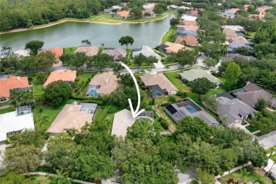 Discover a remarkable 4-bedroom, 3-bathroom pool home in the on Hunters Green Country Club in Florida - for sale on GolfHomes.com, golf home, golf lot