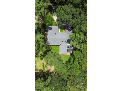 An elegant single-story home nestled in Savannah's prestigious on The Landings Club - Oakridge in Georgia - for sale on GolfHomes.com, golf home, golf lot