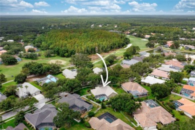 Discover a remarkable 4-bedroom, 3-bathroom pool home in the on Hunters Green Country Club in Florida - for sale on GolfHomes.com, golf home, golf lot