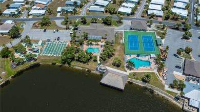 Don't overlook this sparkling clean, split bedroom, open floor on Maple Leaf Golf and Country Club in Florida - for sale on GolfHomes.com, golf home, golf lot