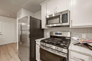 Step into this beautifully updated Gray Myst floorplan featuring on Frisco Lakes Golf Course in Texas - for sale on GolfHomes.com, golf home, golf lot