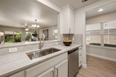 Step into this beautifully updated Gray Myst floorplan featuring on Frisco Lakes Golf Course in Texas - for sale on GolfHomes.com, golf home, golf lot