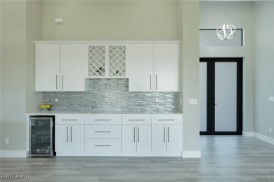 This ONE OF A KIND CUSTOM DESIGNED HOME Epitomizes Contemporary on Burnt Store Golf Club in Florida - for sale on GolfHomes.com, golf home, golf lot