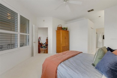 Maintenance-Free Luxury Living with Waterfall Views in on Grasslands Golf and Country Club in Florida - for sale on GolfHomes.com, golf home, golf lot