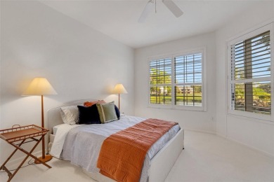Maintenance-Free Luxury Living with Waterfall Views in on Grasslands Golf and Country Club in Florida - for sale on GolfHomes.com, golf home, golf lot