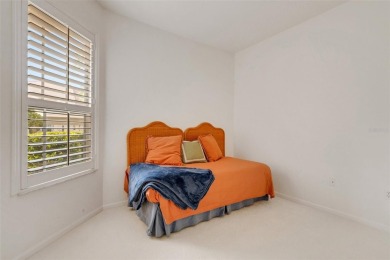 Maintenance-Free Luxury Living with Waterfall Views in on Grasslands Golf and Country Club in Florida - for sale on GolfHomes.com, golf home, golf lot