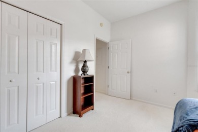 Maintenance-Free Luxury Living with Waterfall Views in on Grasslands Golf and Country Club in Florida - for sale on GolfHomes.com, golf home, golf lot