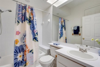 Maintenance-Free Luxury Living with Waterfall Views in on Grasslands Golf and Country Club in Florida - for sale on GolfHomes.com, golf home, golf lot