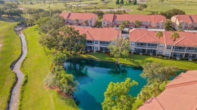 Maintenance-Free Luxury Living with Waterfall Views in on Grasslands Golf and Country Club in Florida - for sale on GolfHomes.com, golf home, golf lot