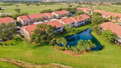 Maintenance-Free Luxury Living with Waterfall Views in on Grasslands Golf and Country Club in Florida - for sale on GolfHomes.com, golf home, golf lot